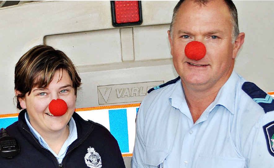 Constable Fiona Scott and Snr Const Darren Black don their red noses for Red Nose Day. Constable Fiona Scott and Snr Const Darren Black don their red noses for Red Nose Day.